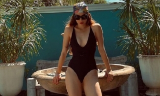 Mẹ 3 con Hồ Ngọc Hà diện áo tắm khoe thân hình chuẩn hơn gái son