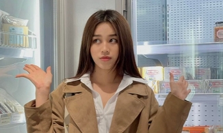 Hoa hậu Đỗ Thị Hà tay xách nách mang lên đường về nhà ăn Tết 