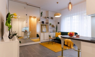 Căn hộ 33m² có thiết kế đặc biệt khi bố trí phòng bếp ngay ở góc hành lang