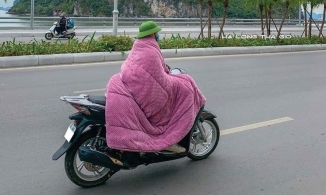 Muôn kiểu 'chạy rét' bá đạo của người dân khi gió đông về