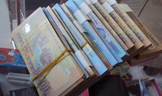 Đổi tiền lẻ dịp Tết kiếm lời có thể bị xử phạt 80 triệu đồng