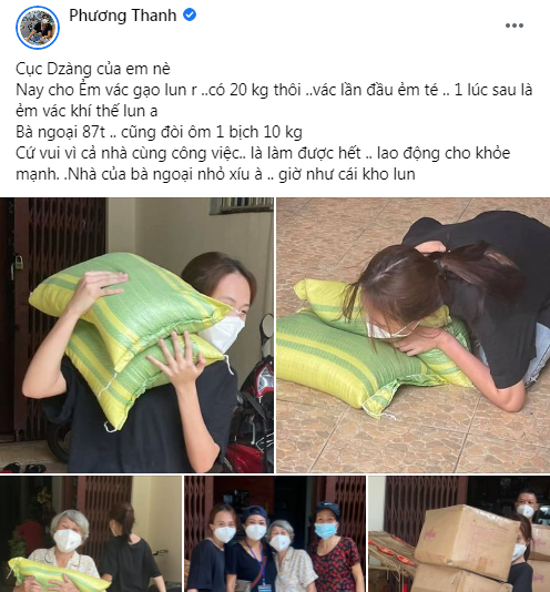 Làm từ thiện cùng mẹ, con gái Phương Thanh vác 20kg gạo - Ảnh 1