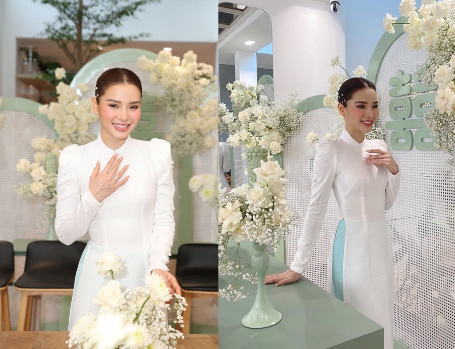 Trước Minh Hằng, Phương Trinh Jolie từng được hết mực khen ngợi bởi visual xinh đẹp với áo dài trắng trong ngày cưới. Thay vì đồng bộ, nữ ca sĩ đã tạo điểm nhấn bằng chiếc quần màu xanh ngọc.