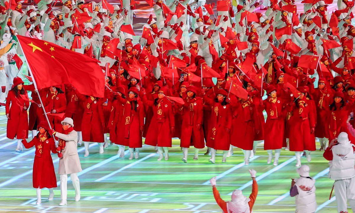 Nhìn lại lễ khai mạc Olympic Bắc Kinh 2022: Đấu trường thể thao trở thành sàn diễn thời trang? - Ảnh 11