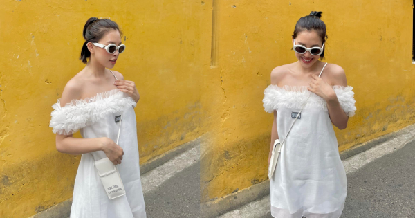 Hoa hậu Tiểu Vy về thăm quê với chiếc đầm hở trên hở dưới, đạp xe đi chơi