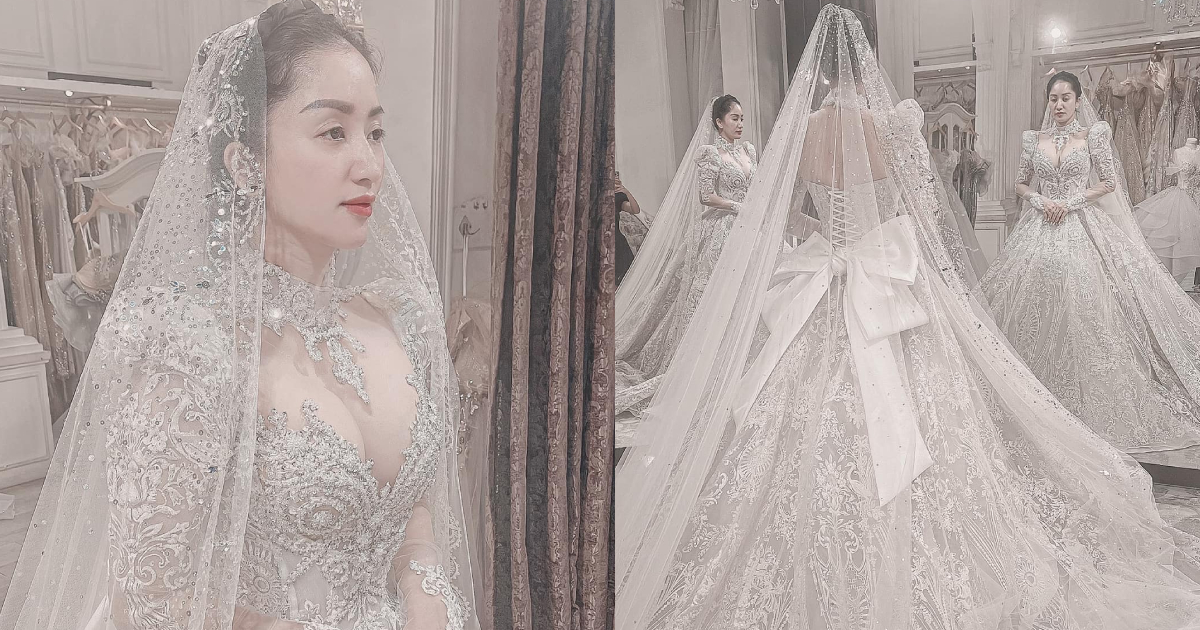 Khánh Thi mặc váy cưới lóng lánh kiêu sa, vòng một căng tràn chiếm spotlight
