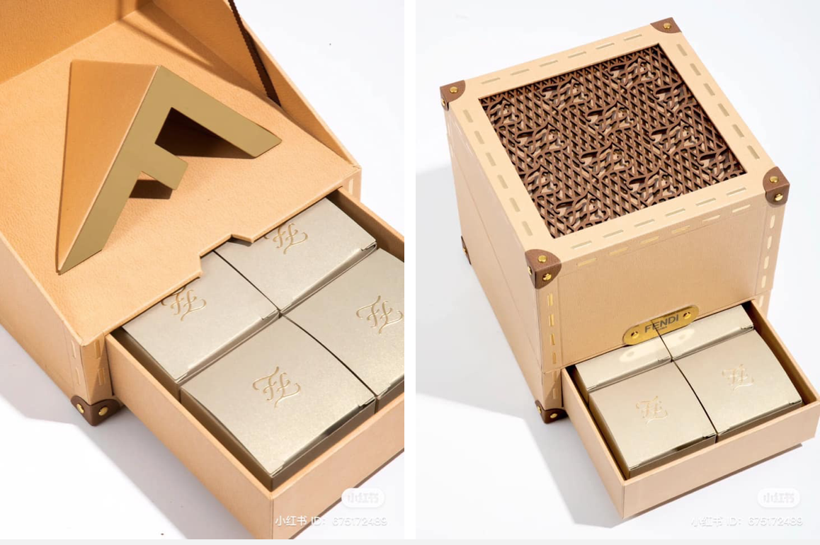 Fendi sử dụng hộp gỗ, nổi bật bên trong là chữ 'F' dựng hình 3D.