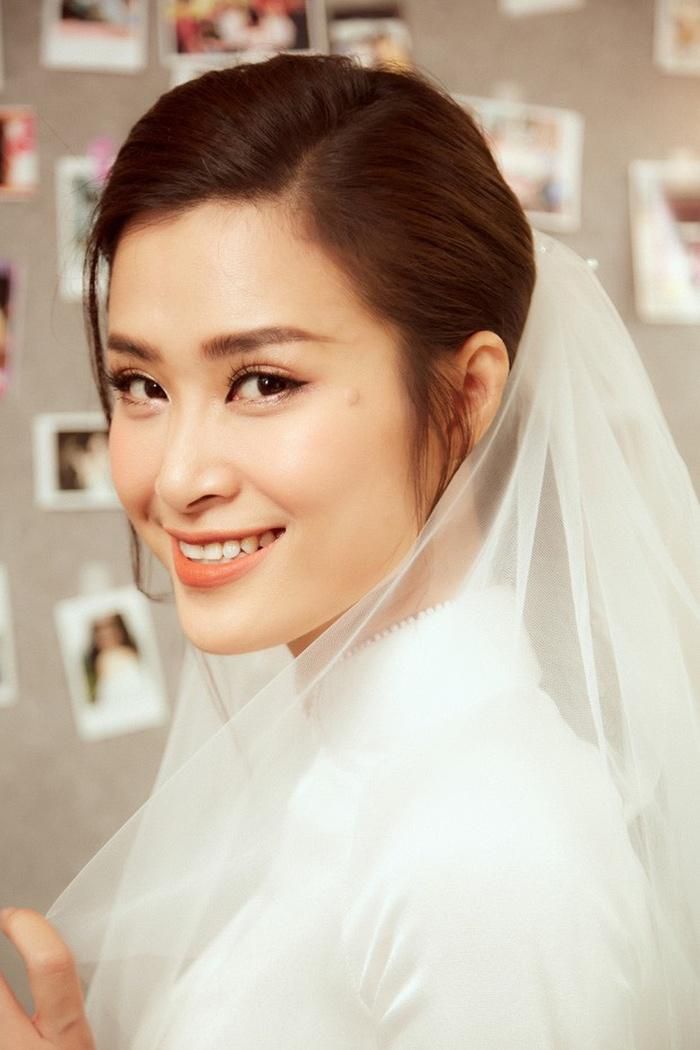 Phương Trinh Jolie, Đông Nhi và dàn mỹ nhân Việt chọn áo dài trắng tinh khôi trong ngày cưới - Ảnh 7