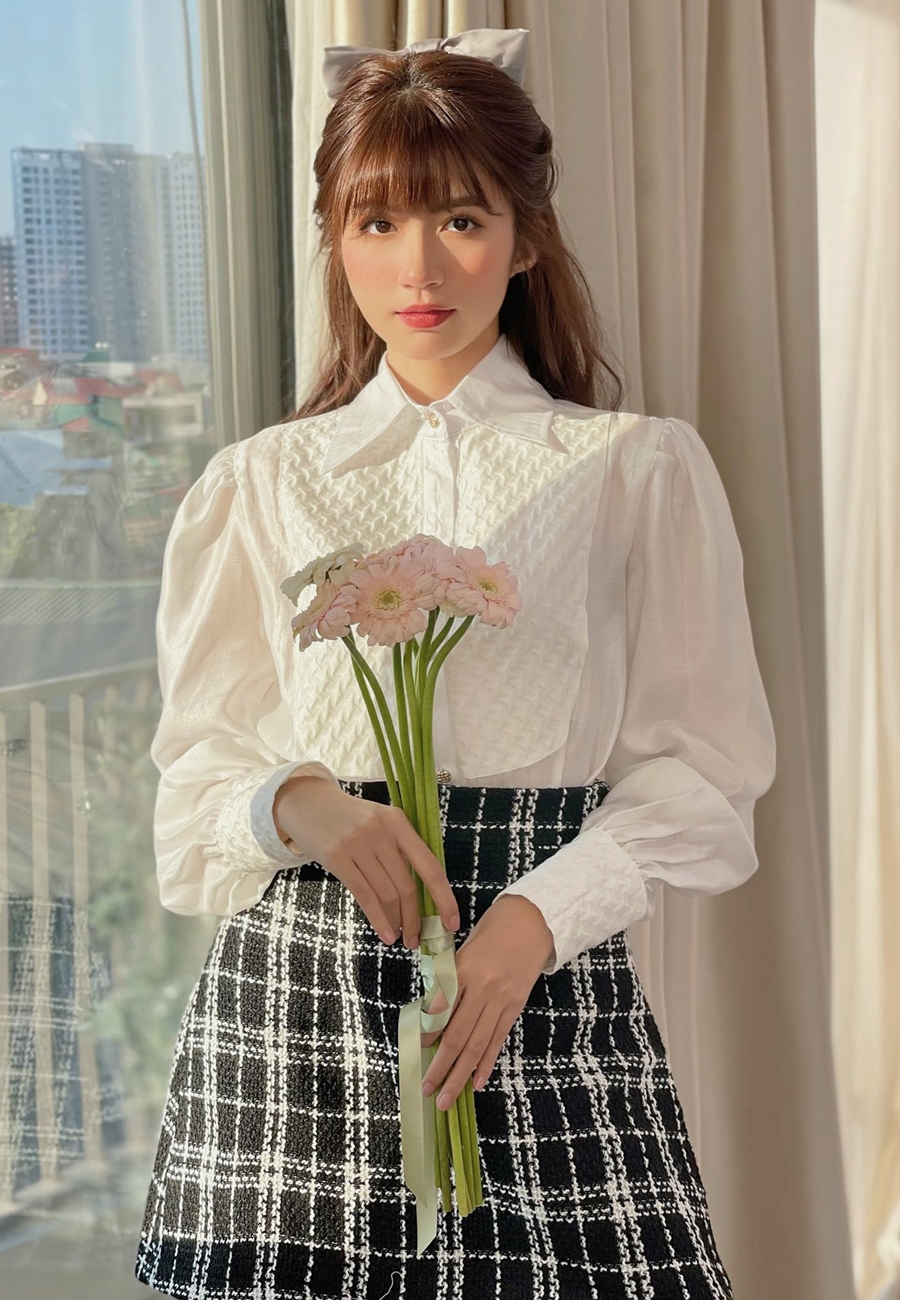 Phong cách Ngọc Huyền về sau theo hướng công sở nữ tính.