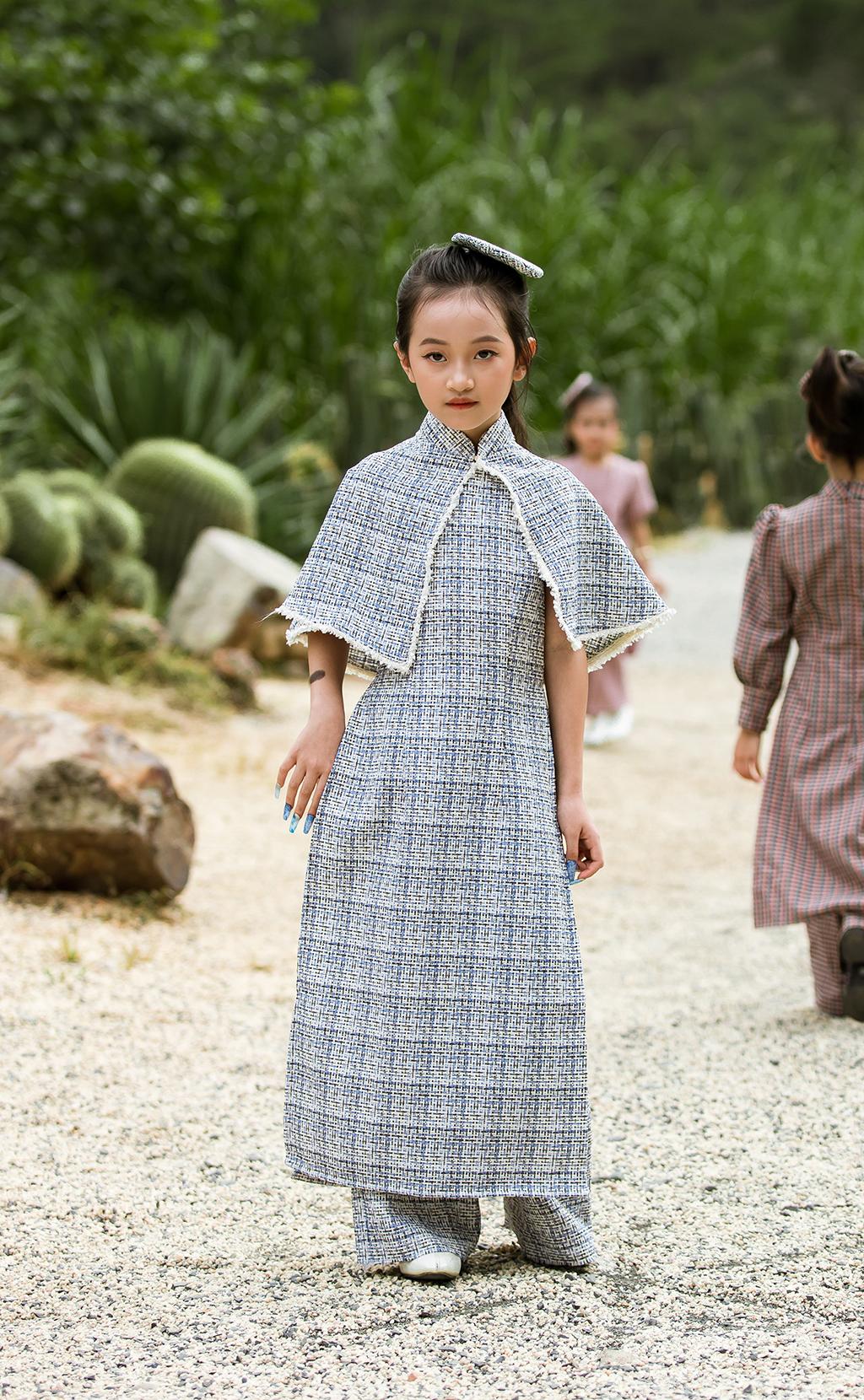 NTK Phương Hồ lần đầu kết hợp chất liệu dạ tweed với áo dài trong BST In Fall  - Ảnh 4