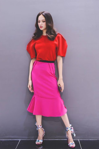 Hoa hậu Hương Giang từng thử nghiệm 2 gam màu nóng này trong 1 set đồ.