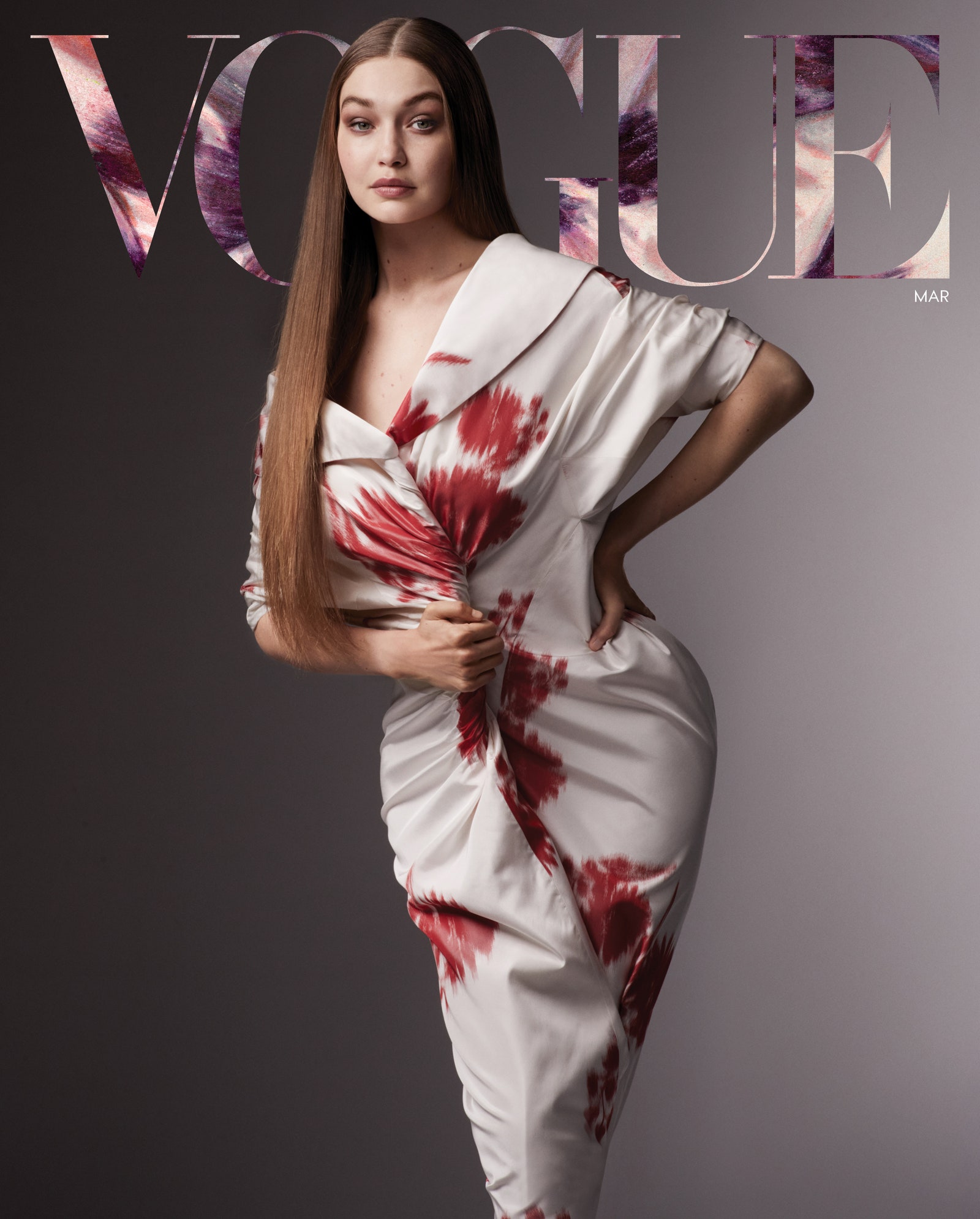 Gigi Hadid là gương mặt trang bìa số tháng 3 của Vogue. Cô cũng có một bài phỏng vấn với tạp chí chia sẻ về trải nghiệm làm mẹ lần đầu tiên. Trong ảnh, cô diện váy của Prada