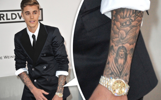 Người nối tiếng hồi hận về hình xăm của mình - Ảnh 6