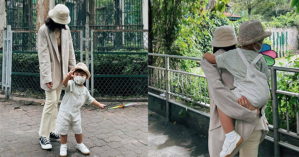 Xa chồng nửa năm, hình ảnh Hòa Minzy tần tảo cõng con đi chơi khiến fan xúc động