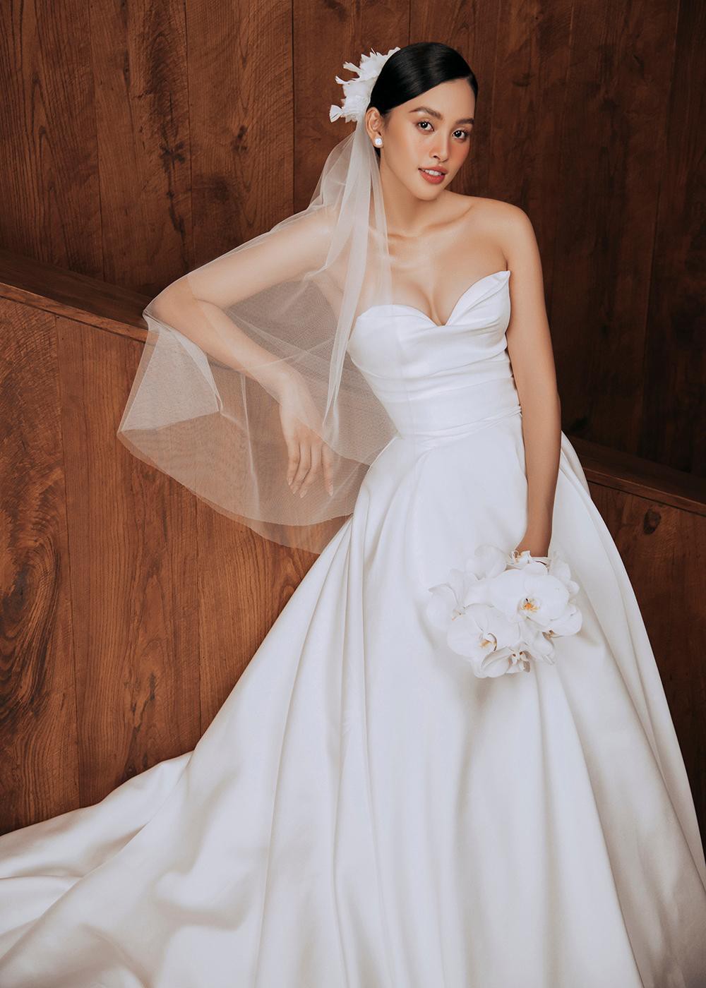 Hoa hậu Tiểu Vy diện váy cưới, nhan sắc yêu kiều không kém những nàng dâu mới của showbiz Việt - Ảnh 9
