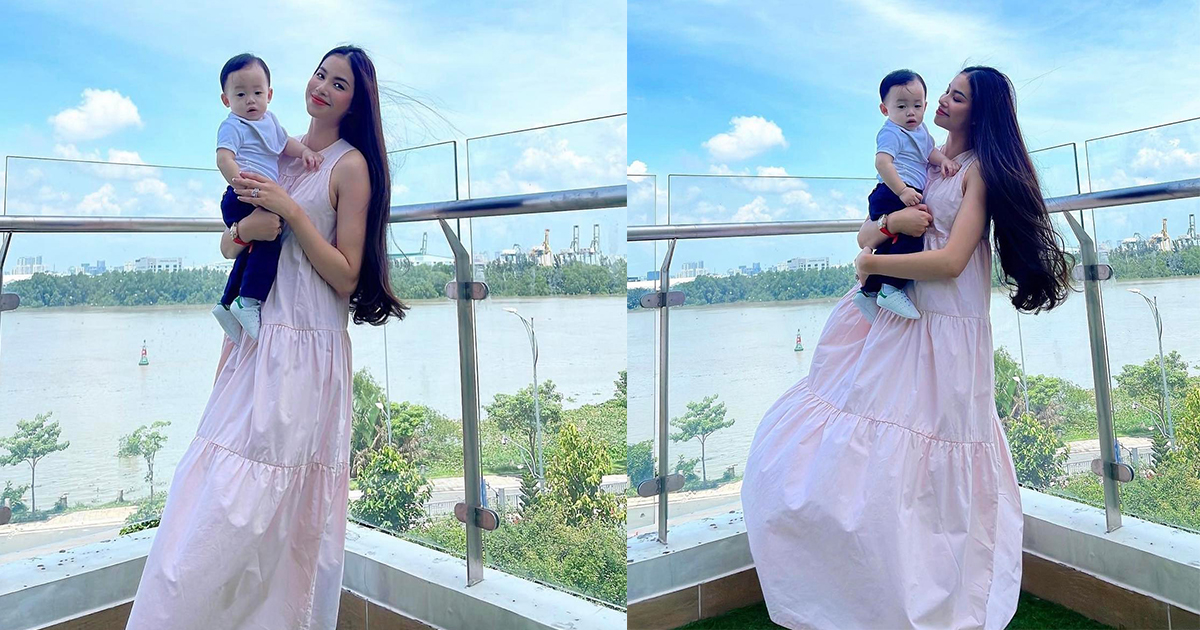 Phạm Hương về Việt Nam vẫn diện váy rộng thùng thình giữa tin đồn bầu bí