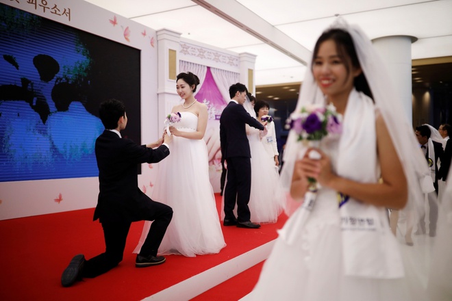 Đề xuất đưa các lớp giảng dạy về hôn nhân, gia đình như một phần bắt buộc trong chương trình học đại học tại Trung Quốc. Ảnh: Reuters.