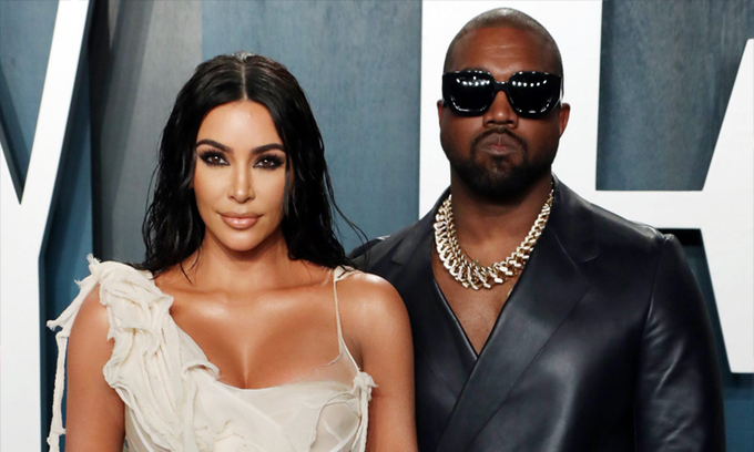 Kim Kardashian (trái) và Kanye West thời còn bên nhau. Ảnh: AFP.