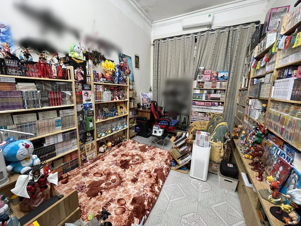 toan canh can phong ngap tran nhung cuon truyen Toàn cảnh căn phòng ngập tràn những cuốn truyện.