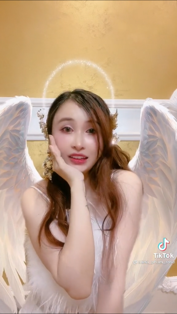 Vợ hai Minh Nhựa đeo cánh thiên thần, trổ tài rap 'Thiên Đàng' - Ảnh 1
