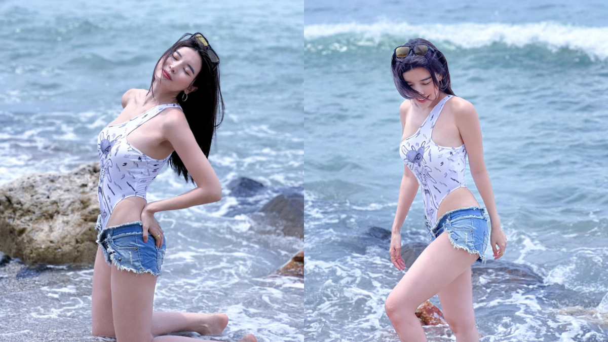 Cao Thái Hà mặc quần sooc jean ngắn cũn đi biển khoe trọn cặp chân trắng nõn, dài miên man