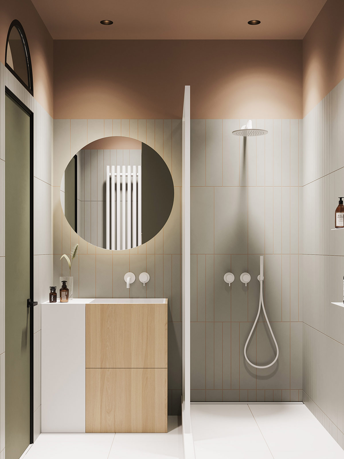 Phòng tắm được thiết kế nhẹ nhàng thanh lịch với vách ngăn màu trắng phân đôi khu vực tắm vòi hoa sen và bồn rửa tay. 