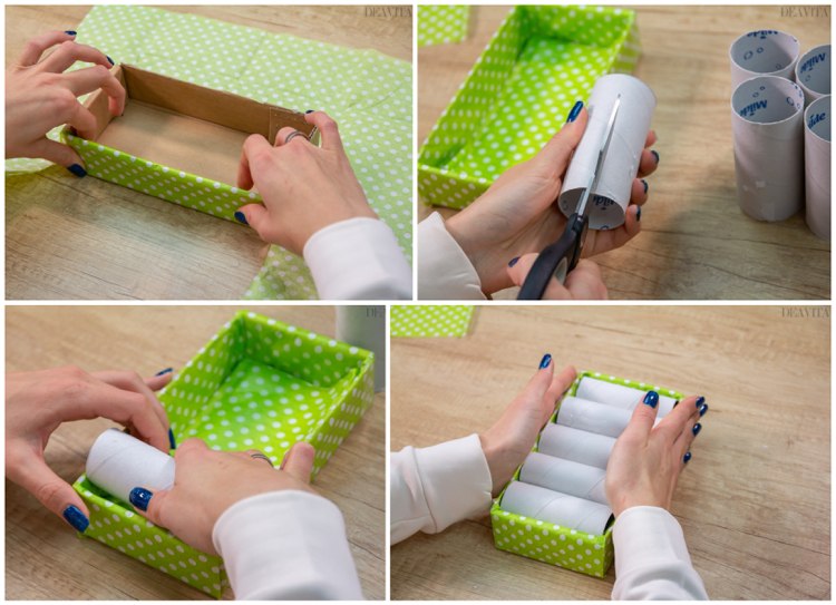 Bọc hộp các tông bằng giấy lụa, cắt lõi cuộn giấy vệ sinh và xếp vào hộp.