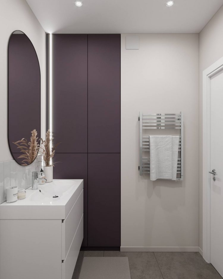 Lối vào phòng tắm xinh xinh với thiết kế bồn rửa tay kết hợp tủ lưu trữ gắn tường để giải phóng diện tích mặt sàn.