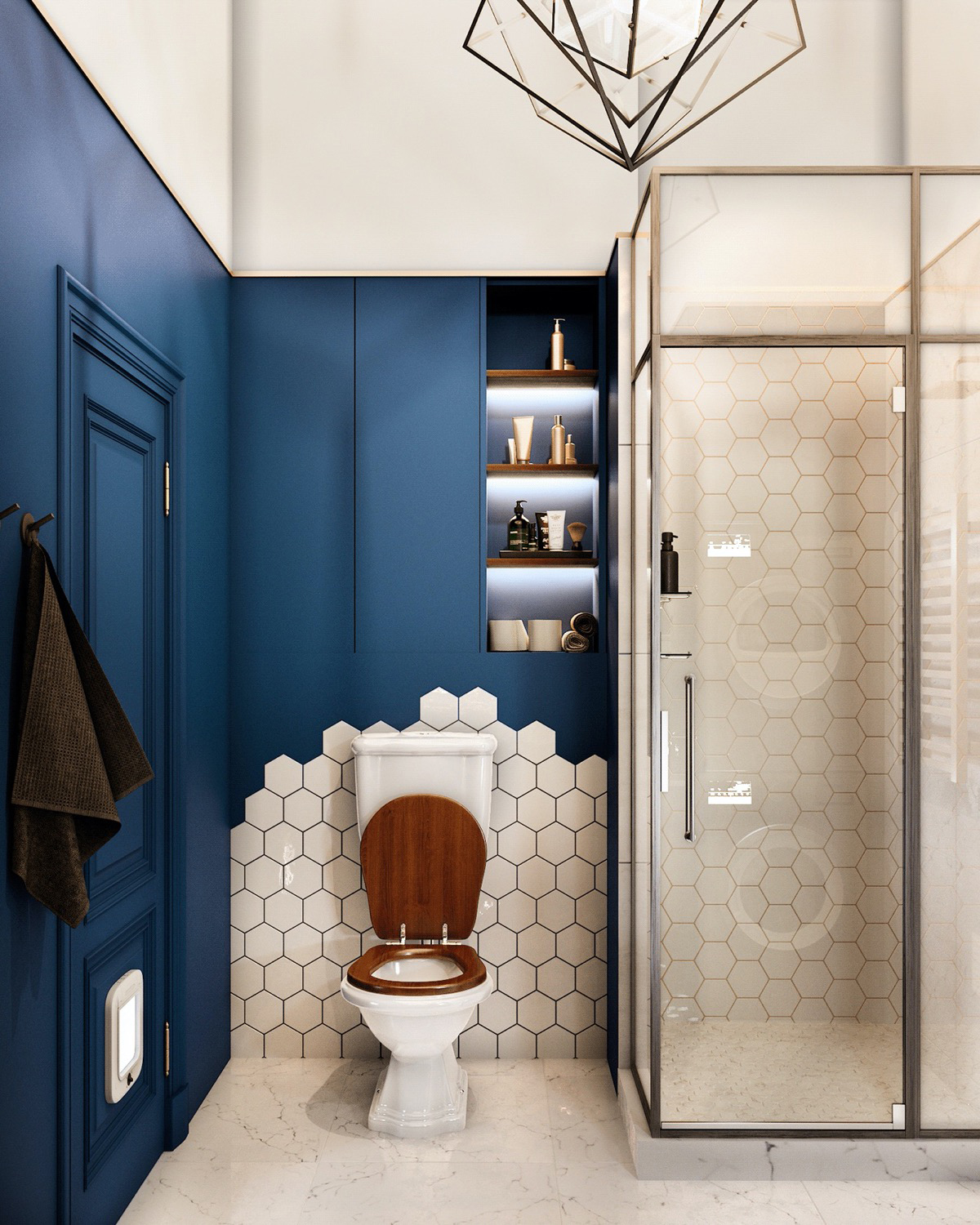 Khu vực toilet thiết kế ấn tượng với sự kết hợp giữa tường sơn xanh coban và một phần ốp gạch tổ ong màu trắng. Loại gạch này cũng được sử dụng cho khu vực buồng tắm đứng cho cái nhìn sang trọng và đẹp mắt.