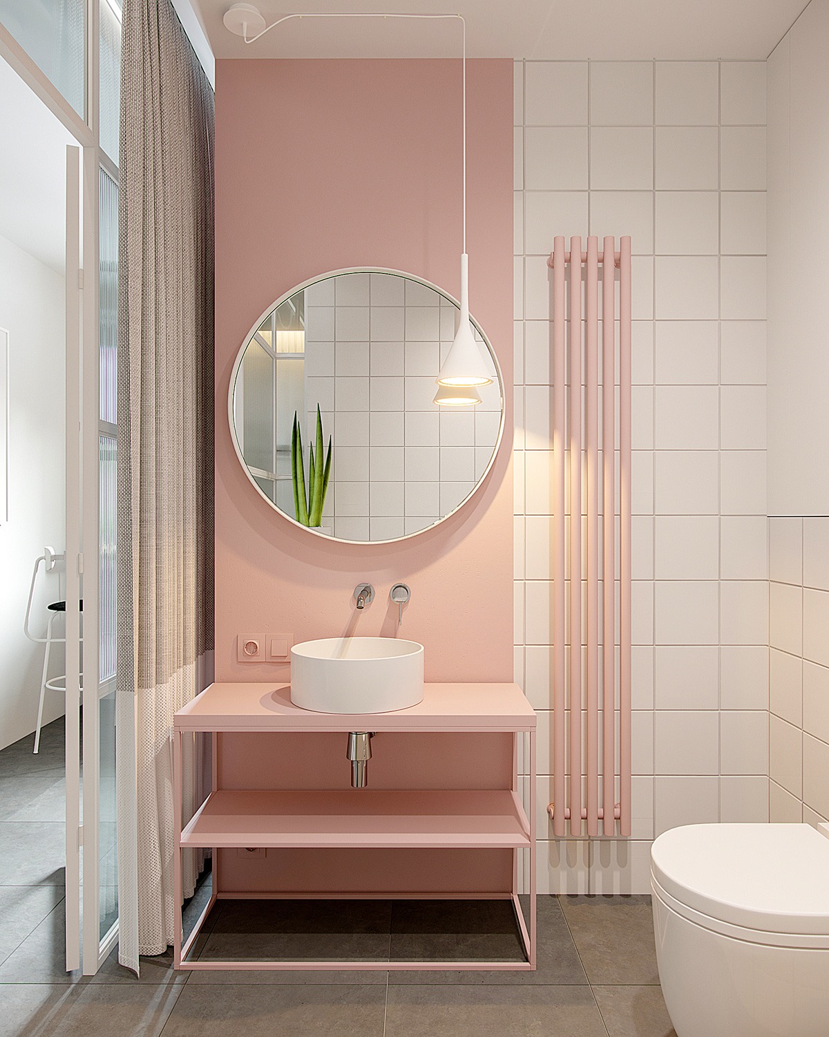 Sự lựa chọn màu hồng pastel kết hợp với màu trắng là giải pháp hoàn hảo giúp cho phòng tắm đẹp nhẹ nhàng nhưng không gây cảm giác sến. Từ sơn tường, kệ bồn rửa cho đến bộ tản nhiệt đều khiến người ta liên tưởng đến que kem dâu tây ngon lành.