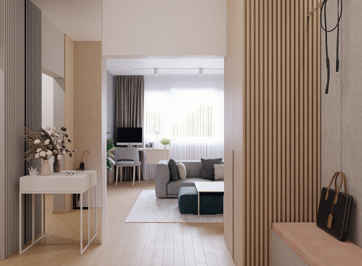 Kết cấu các thanh gỗ màu xám hoặc màu gỗ tự nhiên được sử dụng trong gần như toàn bộ nội thất đóng vai trò phân vùng các không gian trong căn hộ một cách đẹp mắt và hiện đại, không thô cứng như những bức tường kín nhưng cũng không quá phóng khoáng mà đánh mất sự riêng tư.