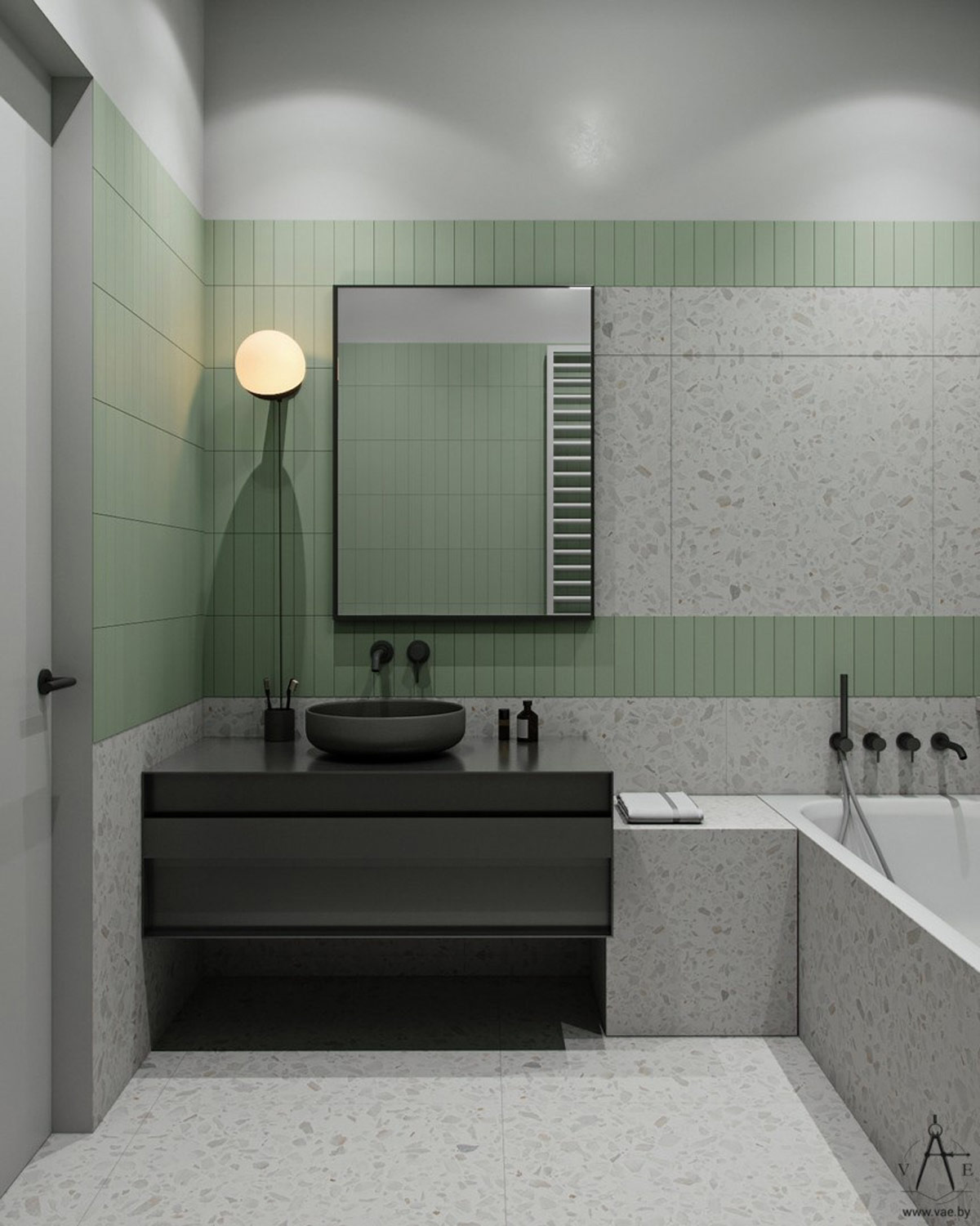 Phòng tắm riêng của con được thiết kế với bức tường kết hợp màu xanh lá cây và gạch terrazzo màu xám trẻ trung. Chiếc tủ lưu trữ kết hợp bồn rửa màu đen cũng tạo nên ấn tượng mạnh mẽ, nam tính cho không gian thư giãn của bé trai.