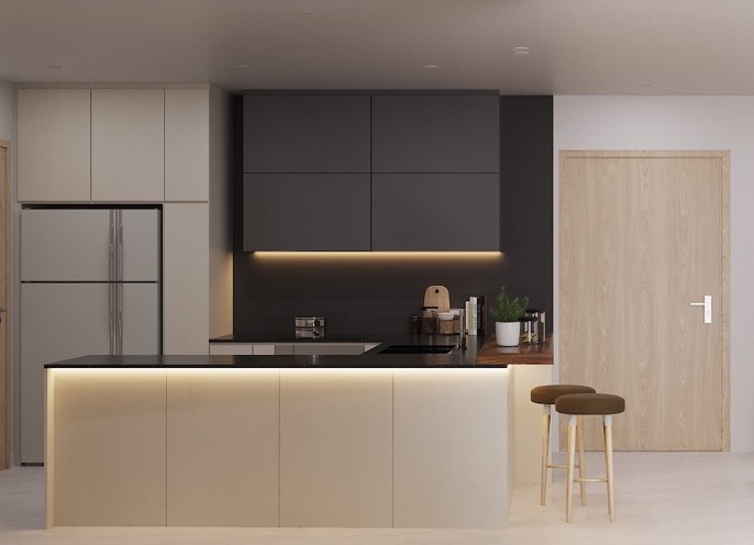 Phòng bếp này lại tạo cho mình một phong cách rất riêng khi kết hợp sự tươi sáng của gỗ tự nhiên với cùng nội thất có lớp hoàn thiện màu đen để tạo sự tương phản. Hệ thống đèn LED tích hợp dưới mặt bàn và tủ bếp tạo nên ánh sáng đẹp mắt cũng như “khoanh vùng” phòng bếp với các khu vực chức năng khác.