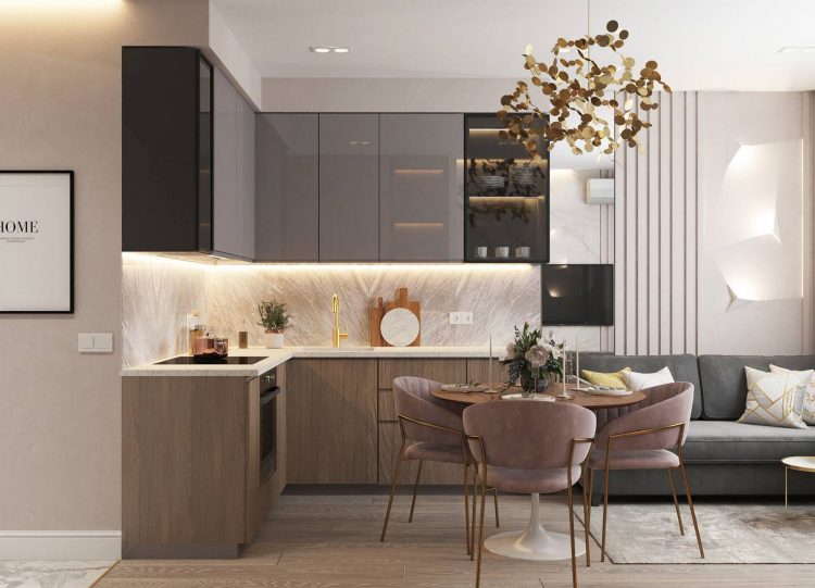 Phòng bếp với thiết kế tủ bếp kiểu chữ L gọn gàng, phù hợp với cấu trúc căn hộ. Sự đối lập về màu sắc của tủ bếp trên - dưới và đèn gầm khiến bếp nhỏ sáng bừng nổi bật.