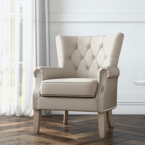 Sự pha trộn giữa nét truyền thống và hiện đại giúp chiếc ghế này góp mặt trong bộ sưu tập ghế bành mà chúng tôi giới thiệu. Nó sử dụng vải chéo hiện đại, trang trí bởi đinh mũ kim loại làm điểm nhấn, chân ghế gỗ tự nhiên tăng vẻ truyền thống mộc mạc.