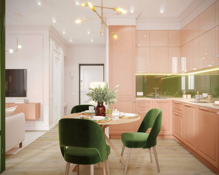 Nếu phòng khách lựa chọn màu trắng tươi sáng chủ đạo thì phòng bếp và góc ăn uống sử dụng màu hồng cam và xanh lá để phân vùng khu vực chức năng bằng màu sắc.