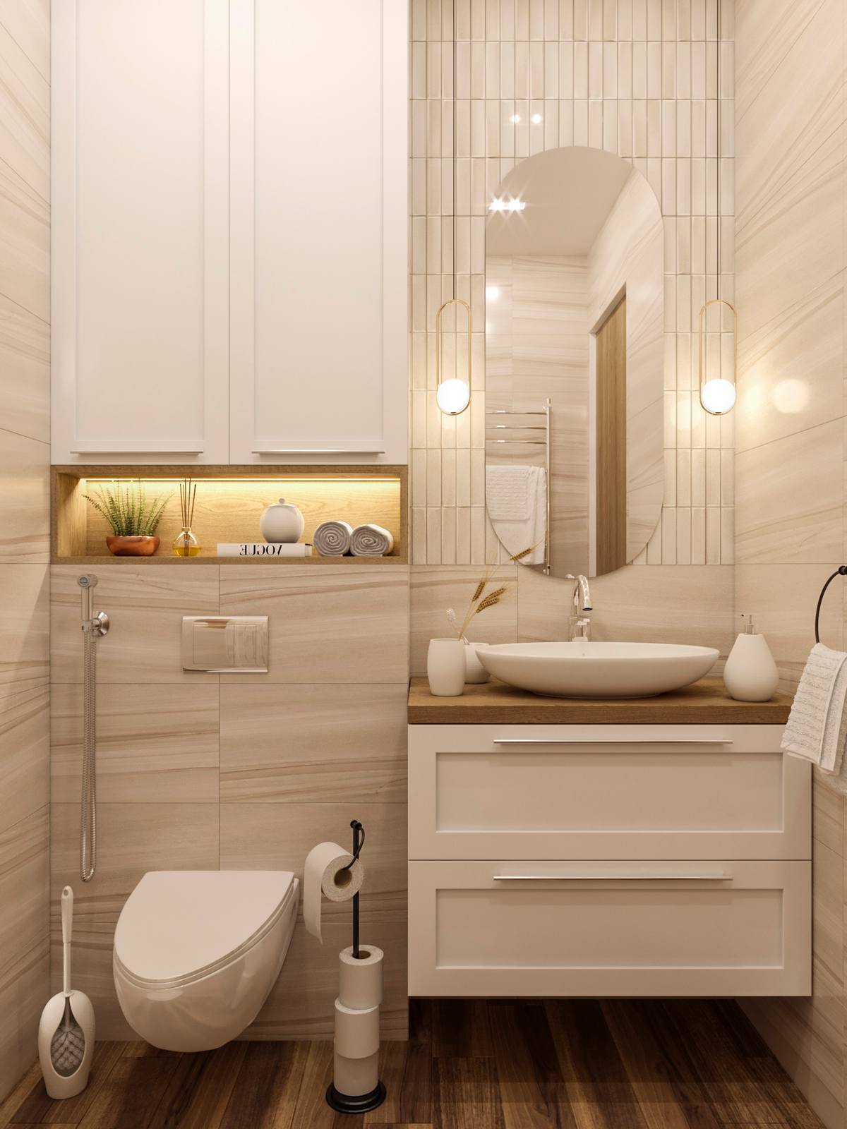 Căn hộ thiết kế một phòng tắm chung với gam màu be nhạt kết hợp trắng cùng hệ thống đèn thả, đèn gầm có ánh sáng vàng để tạo cảm giác ấm áp. Tủ lưu trữ kết hợp bồn rửa và toilet đều có thiết kế gắn tường để giải phóng mặt sàn.