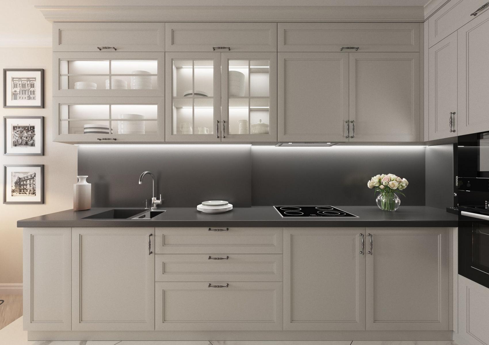 Phòng bếp thiết kế hiện đại với gam màu xám kết hợp đen ở mặt bàn và backsplash. Hệ thống đèn gầm ở dưới tủ bếp cũng như các ngăn đựng chén bát cho khu vực nấu nướng sáng sủa.