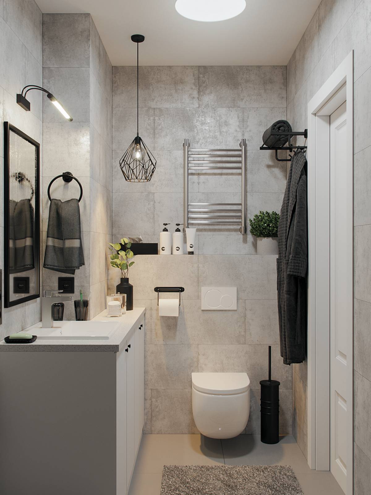 Phòng tắm tuy nhỏ nhưng vẫn rất tiện nghi nhờ nội thất gắn tường giúp giải phóng diện tích mặt sàn cùng đèn ốp trần cho không gian thoáng sáng.