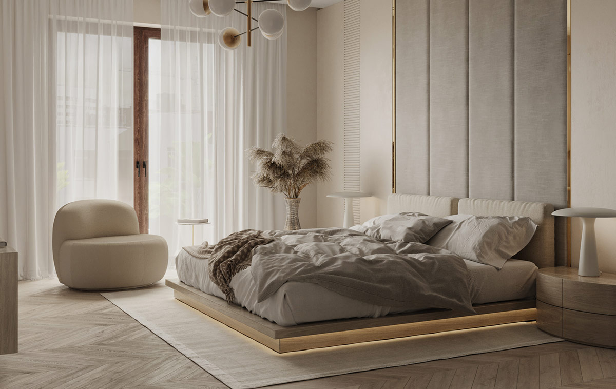 Trong phòng ngủ, một chiếc giường nền hiện đại có đầu giường đệm cao từ trần đến sàn, được trang trí bằng các chi tiết vàng bóng bẩy. Các dải đèn LED ẩn chiếu sáng xung quanh chân giường tạo hiệu ứng lung linh.