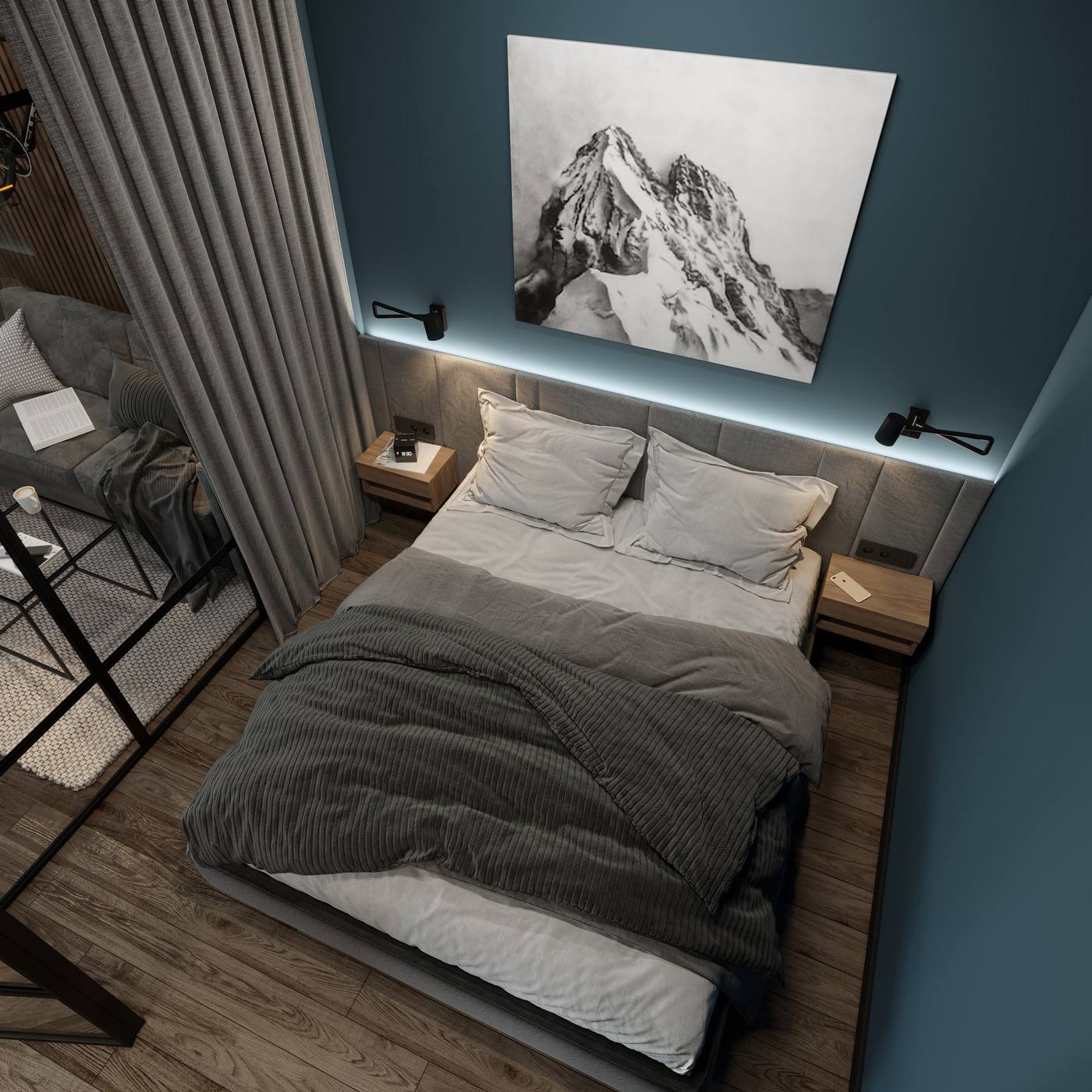Hình ảnh phòng ngủ với góc chụp từ trên cao, có thể thấy giường ngủ được bố trí ở trung tâm. Đèn gắn tường và táp đầu giường bằng gỗ bố trí đối xứng nhau tạo cho không gian vẻ cân đối, hài hòa.