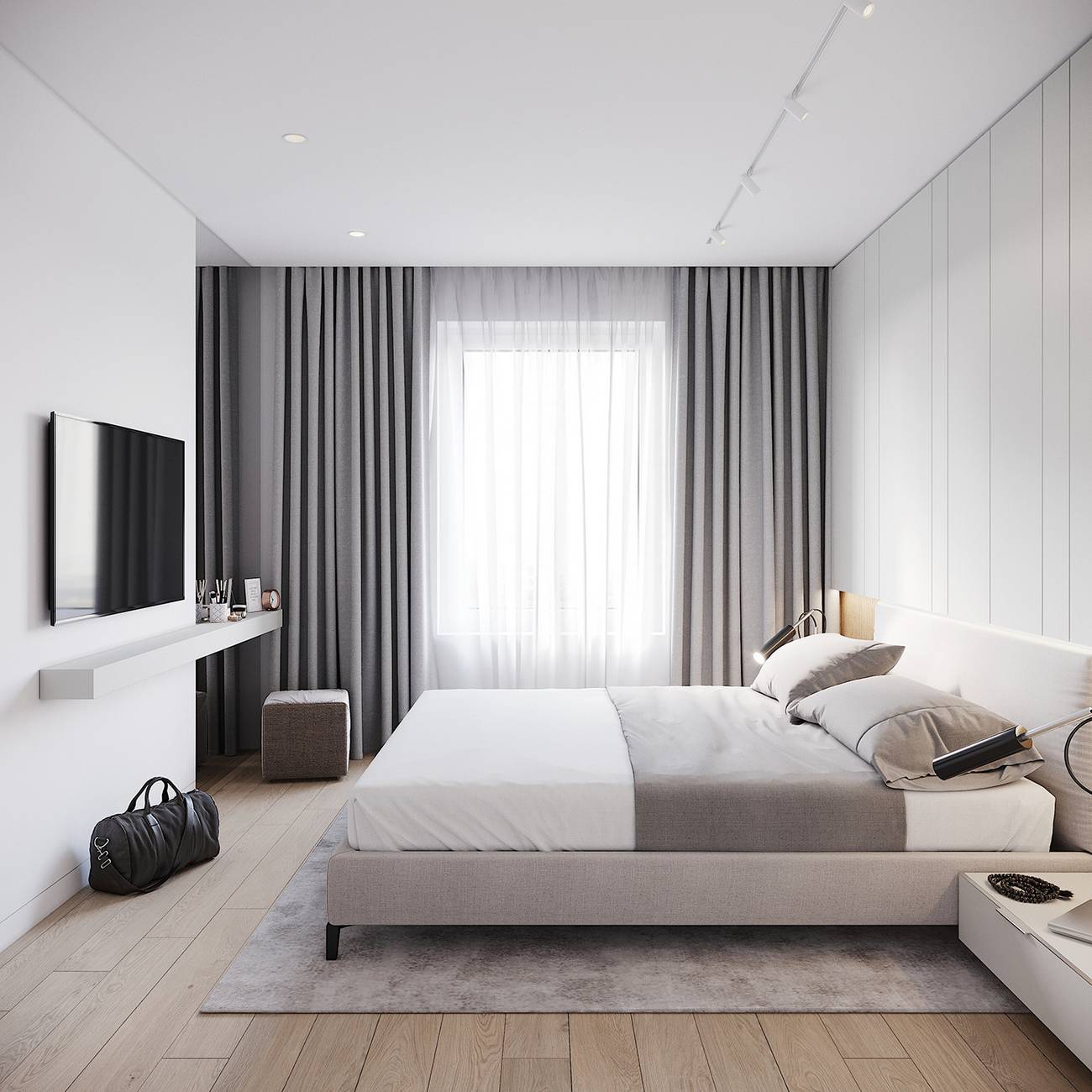 Tương tự phòng khách, phòng ngủ cũng sử dụng gam màu trắng - xám chủ đạo. Nội thất tối giản với đường nét gọn gàng, rất ít phụ kiện trang trí. Rèm cửa sổ tích hợp 2 lớp mỏng và dày để sử dụng theo nhu cầu cản nắng hay tạo sự riêng tư của gia chủ.
