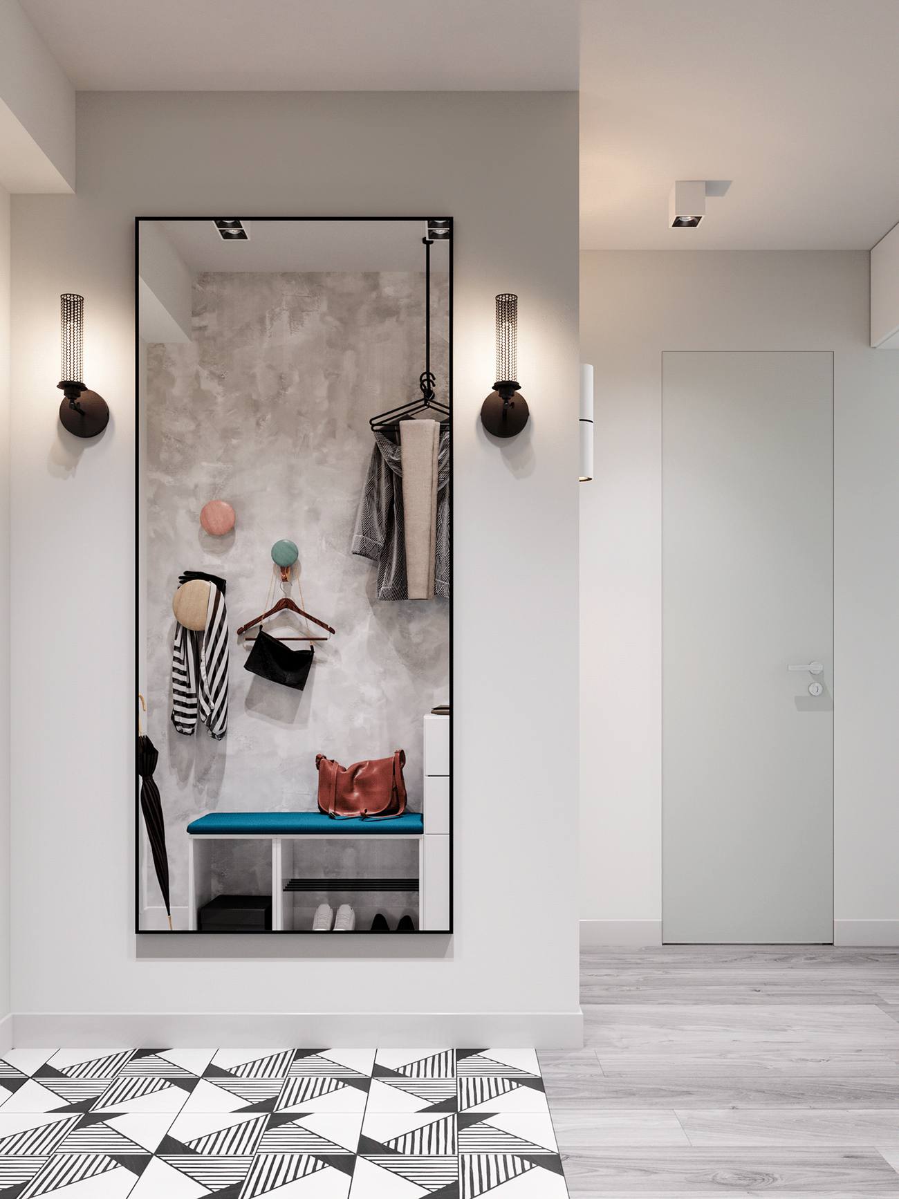 Đối diện là tấm gương soi khổ lớn treo dọc bức tường. Hai bên là đèn gắn tường thiết kế độc đáo làm tôn lên vẻ đẹp của không gian nhỏ. Tấm gương vừa giúp chủ nhân chỉnh trang y phục trước khi ra khỏi nhà vừa góp phần 'nhân đôi' lối vào.
