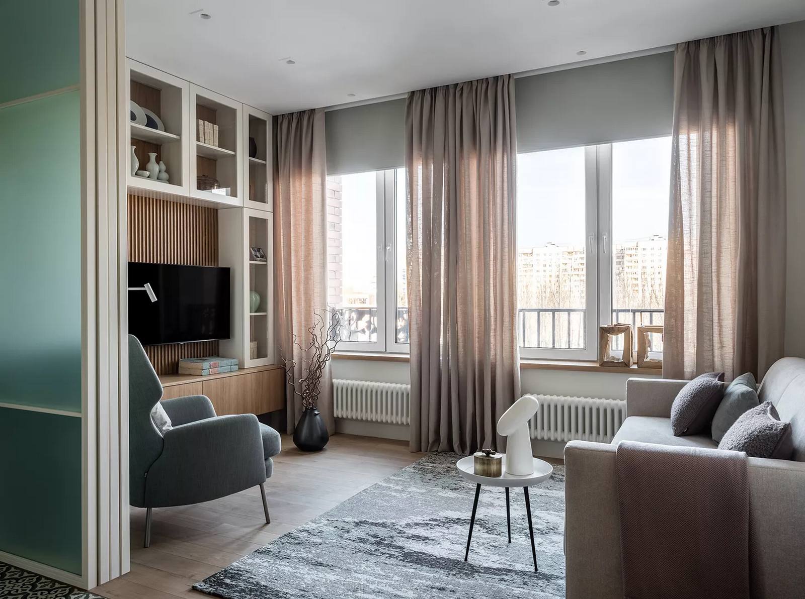 Cải tạo căn hộ 45m² với gam màu xanh ngọc lam nhẹ nhàng cùng hệ thống lưu trữ khéo léo