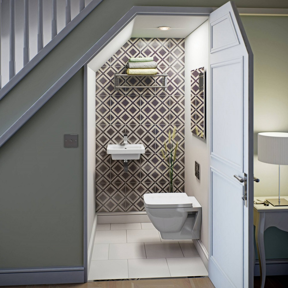 Thêm một cách khác để tận dụng không gian dưới gầm cầu thang là thêm một phòng tắm hoặc nhà vệ sinh nhỏ gọn. 
