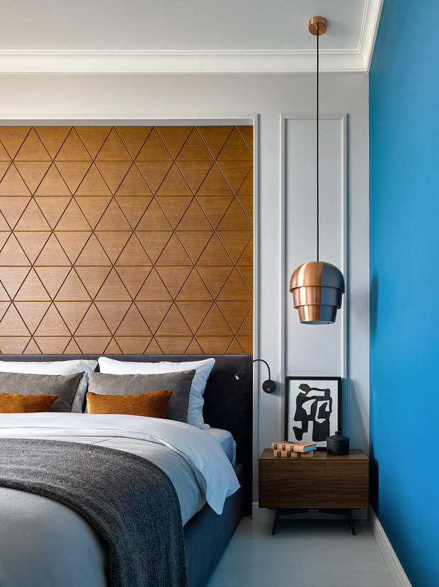 Để tăng thêm bầu không khí yên bình mộc mạc cho căn phòng thì bức tường ốp gỗ là ý tưởng khá hay ho.