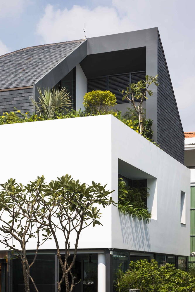 Ngôi nhà như khối lập phương trắng độc đáo cùng sắc xanh cây cối nổi bật giữa “khu nhà giàu” Sài Gòn - Ảnh 22